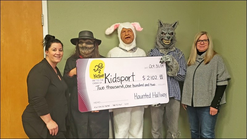 Characters and volunteers who hosted the Halloween Haunted House presented the proceeds from their event to KidSport in Unity, showcasing the value of community events, activities and volunteers who work all year to benefit a number of places and spaces in Unity.