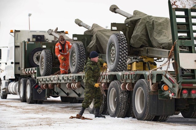 The 105-mm Howitzers are loaded onto trucks in Manitoba. Photo: Facebook - Maritime Forces Pacific