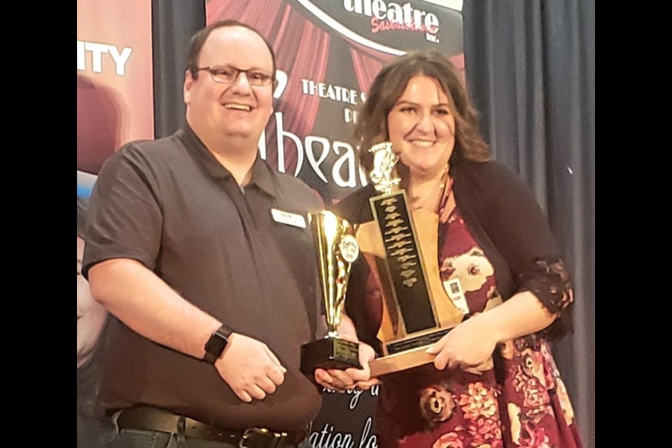 Theatre Saskatchewan Board  member John Dyck (North Battleford)presents award to Teresa Weber.