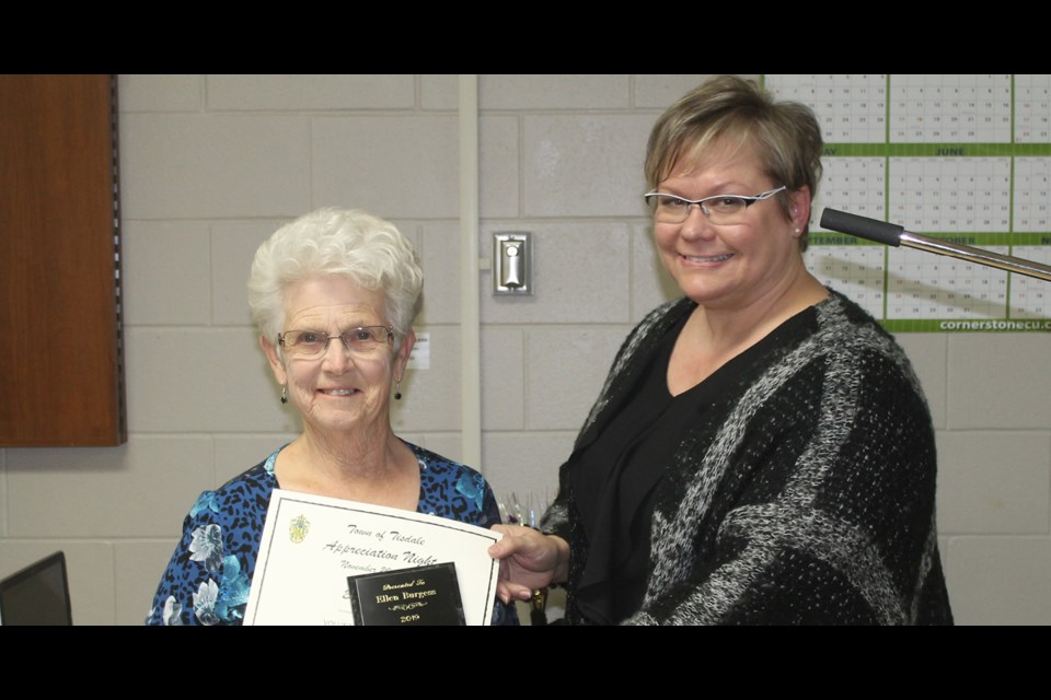 Ellen Burgess receives the Volunteer of the Year Lifetime Achievement award from Lesley Thibault director of recreation and parks for Tisdale, at the town’s 39th annual Appreciation Night. Photo by Jessica R. Durling