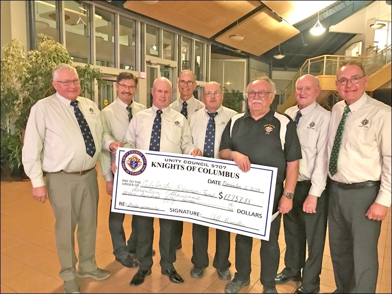 Members of the Unity Knights of Columbus attended a gala event Nov. 2 where they presented a donation of $17,757.55 from their Pattison Children’s Hospital Unity Gala. Pictured are Tim Guth, Len Grant, Jeff Krupka, Gary Bertoia, Gerald Beres and Gary Maier, chair of K of C celebrity dinner. Representing the children’s hospital are Peter Gartner and Michael Soloski. Photo submitted