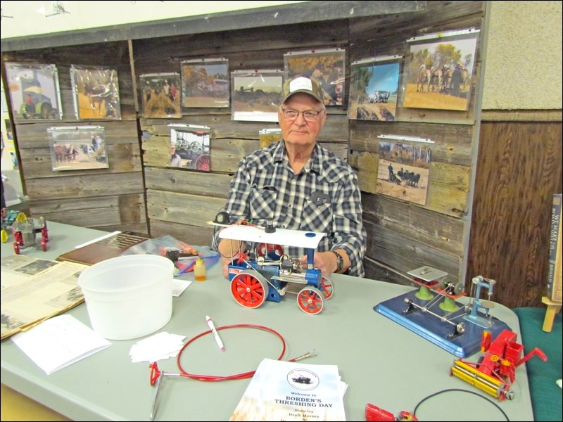 Stew Walton with his working steam engine at the Threshermen’s Club display. Photos by Lorraine Olinyk