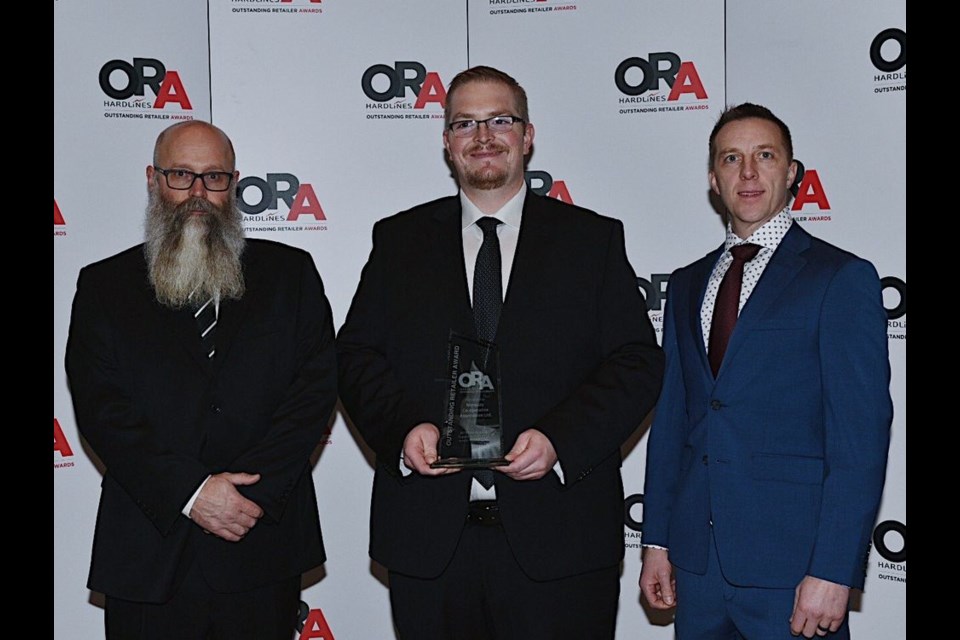 Accepting the ORA (Outstanding Retailer Award) in King City, Ont., on November 13, from left, were: Darin Janzen, Justin Petelski and Doug Nelson of the Norquay Co-op Home Centre.