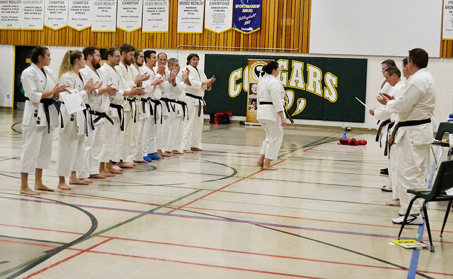 Black belt competitors receiving recognition for completion of the Kata.