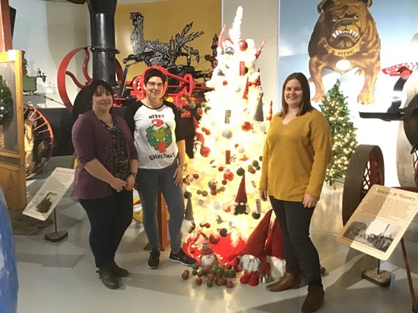 Seen in the photo are the decorating co-chairs Louise Erbach, Koreen Lawrence and Janelle Cox. All photos by John Cairns.