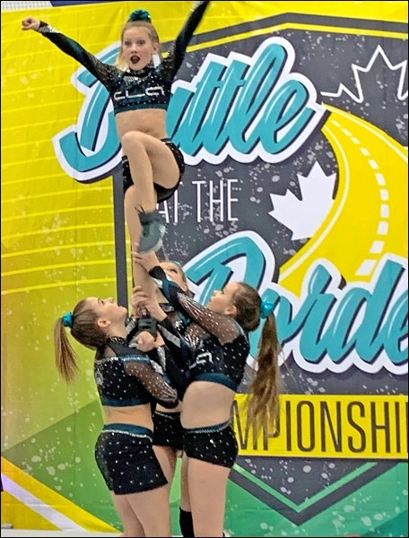 This photo shows a stunt group where the top is doing a liberty,’ or ‘lib’ for short. The top enters