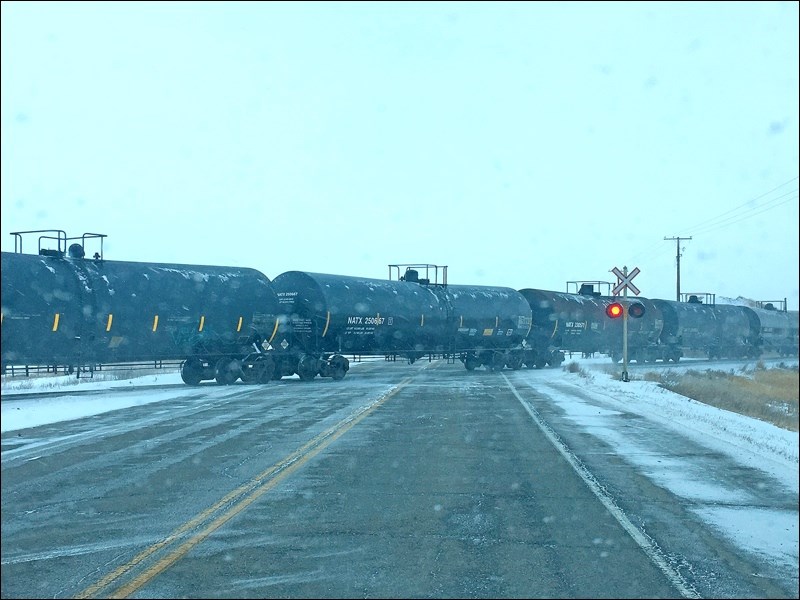 This photo, taken Dec. 30, 2018, shows a crude-by-rail train crossing the tracks near Brian Zinchuk’