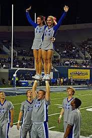 This “double cupie” is a classic crowd pleaser in sport-side cheerleading. Accompanied with chanting
