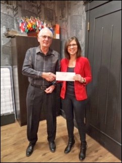 Nester Brunwald of the Kiwanis Club and Nicole Combres, executive director of the Battlefords Boys and Girls Club.