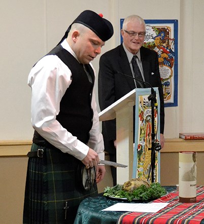 Regan Miller addresses the Haggis.