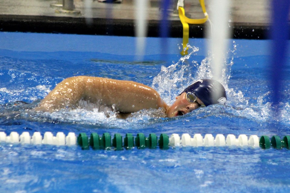 Flin Flon Aqua Jet swimmer Jordan Gorrell takes a quick breath during the boys’ 200-metre freestyle event at the Aqua Jets’ Jan. 25 meet. - PHOTO BY ERIC WESTHAVER