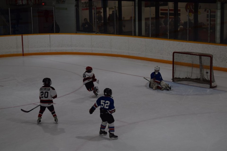 Zarin Godhe of the Canora Novice White Cobras broke in behind a Preeceville Novice Pats defender and hammered a slapshot past the goalie into the net.