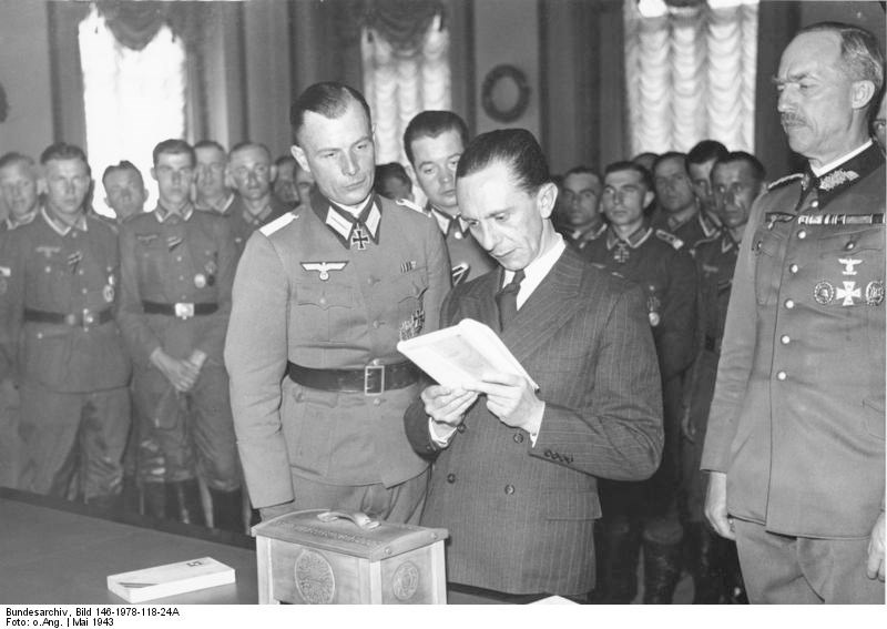 The short guy in the suit, Joseph Goebbels, knew a thing or two about licensing journalists. It was