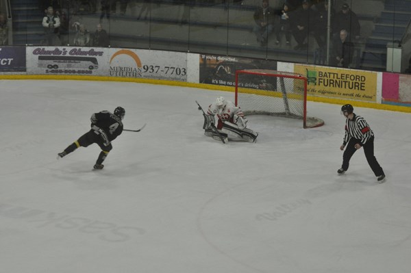 Matthew Fletcher fires the game-winning goal in overtime.