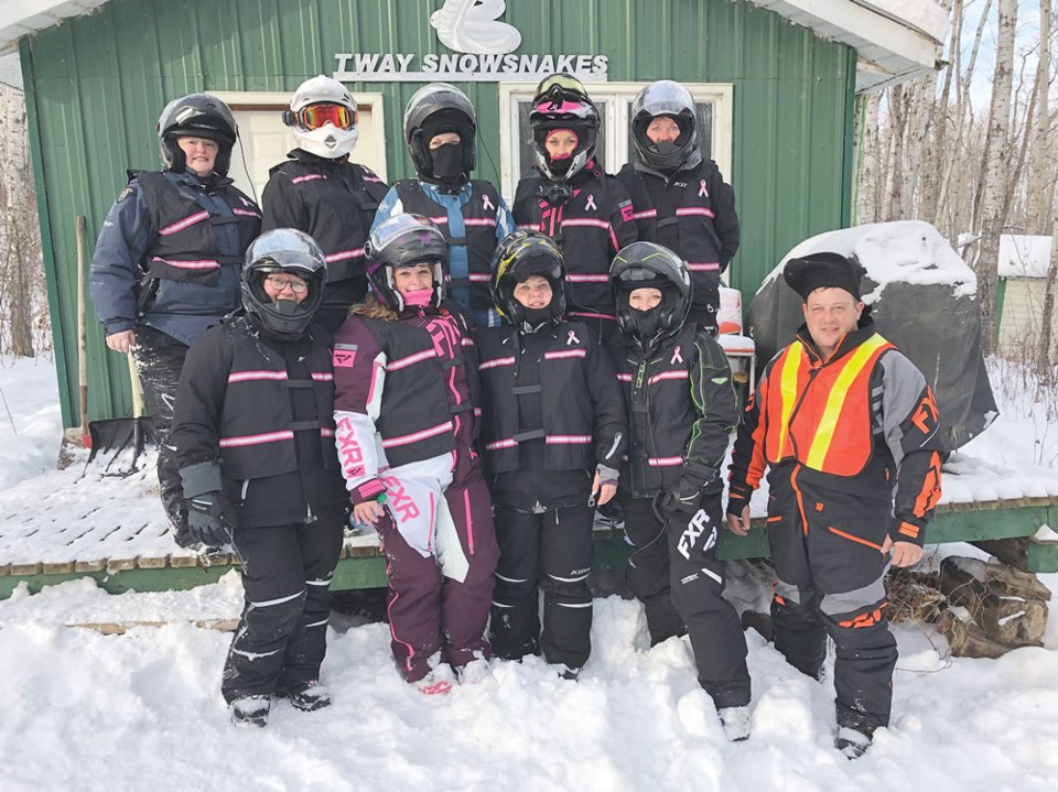 Prairie Women on Snowmobiles
