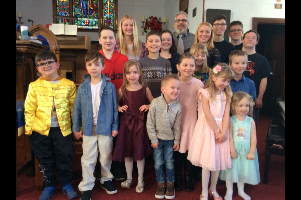 The group which performed during the Harmony House Music recital at the Westminster Memorial United Church on January 24, from left, were: (back) Finley Hudye, Kira Salahub, Darren Kitsch (instructor), Kira Kitsch, Kyler Kitsch, Zachary Burback and Ashley Hollett and (middle) Max Stone, Kennan Kitsch, Meredith Burback and Lucas Stone and (front) Silas Guillet, Jameson Parnetta, Quin Bedore, Nate Bedore, Karisa Kitsch, Karleigh Lambert and Brooklyn Lambert.
