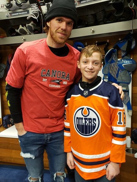 Through the Make-A-Wish Foundation, Kayden Harder of Canora met Connor McDavid, captain of the Edmonton Oilers, on January 30 in Edmonton. McDavid quickly donned a Canora Cougars T-shirt and joined Harder in a video message wishing his peewee hockey team good luck in their upcoming games.