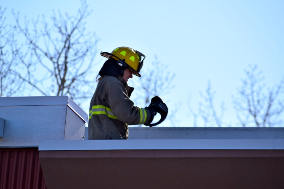 Firefighters working on the roof had special equipment.