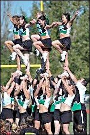 Here is the U of S Huskie Team stunting outdoors. What an awesome way to spend a summer afternoon! T