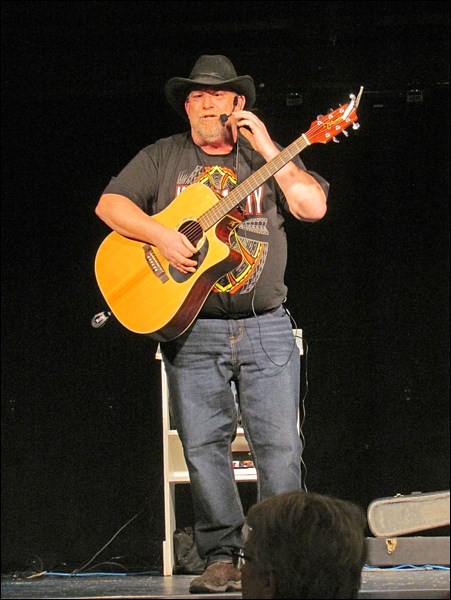Phil Miller entertaining at Langham Feb. 22. Photo by Lorraine Olinyk