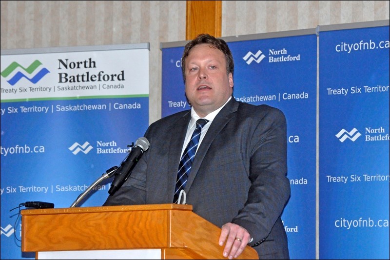 Mayor Ryan Bater speaks at the first State of the City address at the Tropical Inn. Photo by John Ca