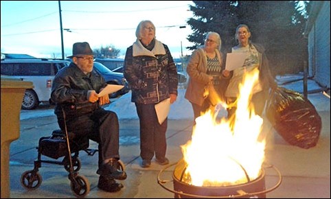 Burning palm leaves on Feb. 25 for Ash Wednesday service - Rev. Carr, Gayle Wensley, Brenda and Bev. Photos by Lorraine Olinyk