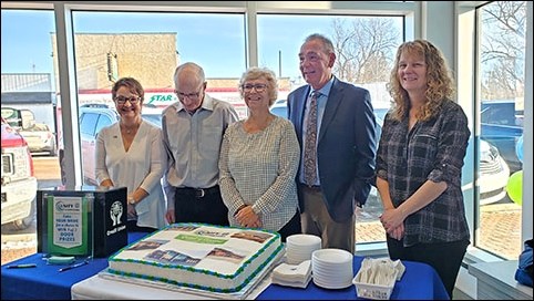 Unity Credit Union board members Sharon Del Frari, Keith Wilson, Colette Lewin, Michael Soloski and Anita Parker ready to cut the grand-reopening cake as part of Unity Credit Unions grand re-opening celebrations.