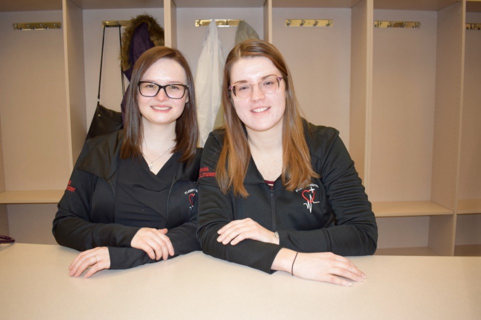 Paige Baldwin, left, and Brianna Hutchinson