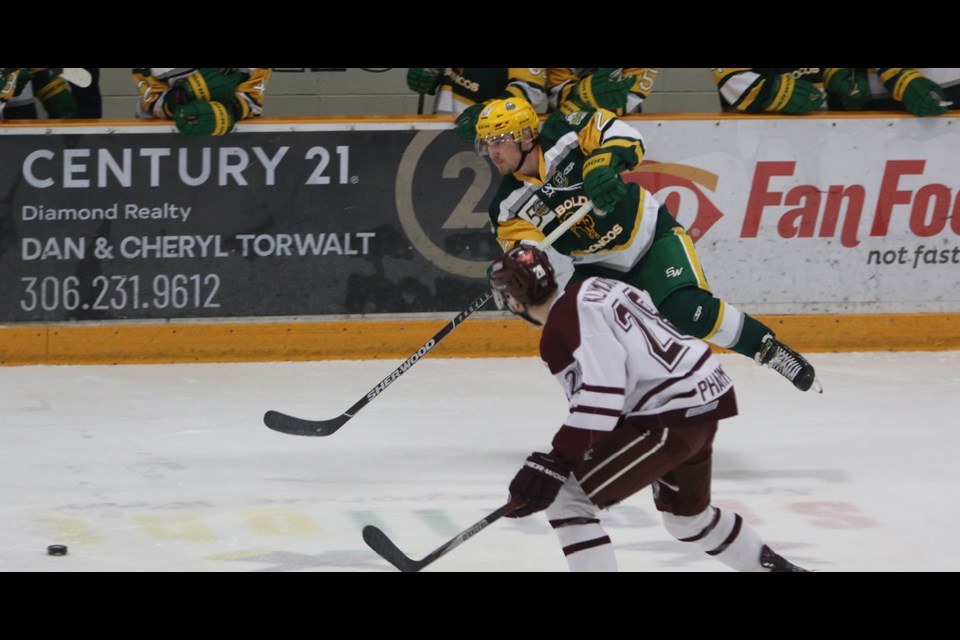 Spencer McHardy goes after the puck during game three of the series against Flin Flon on March 10. Photo by Devan C. Tasa