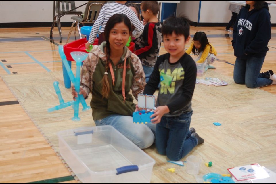 Tang Townsend, left, and her son Lane experimented with the many fun stations.