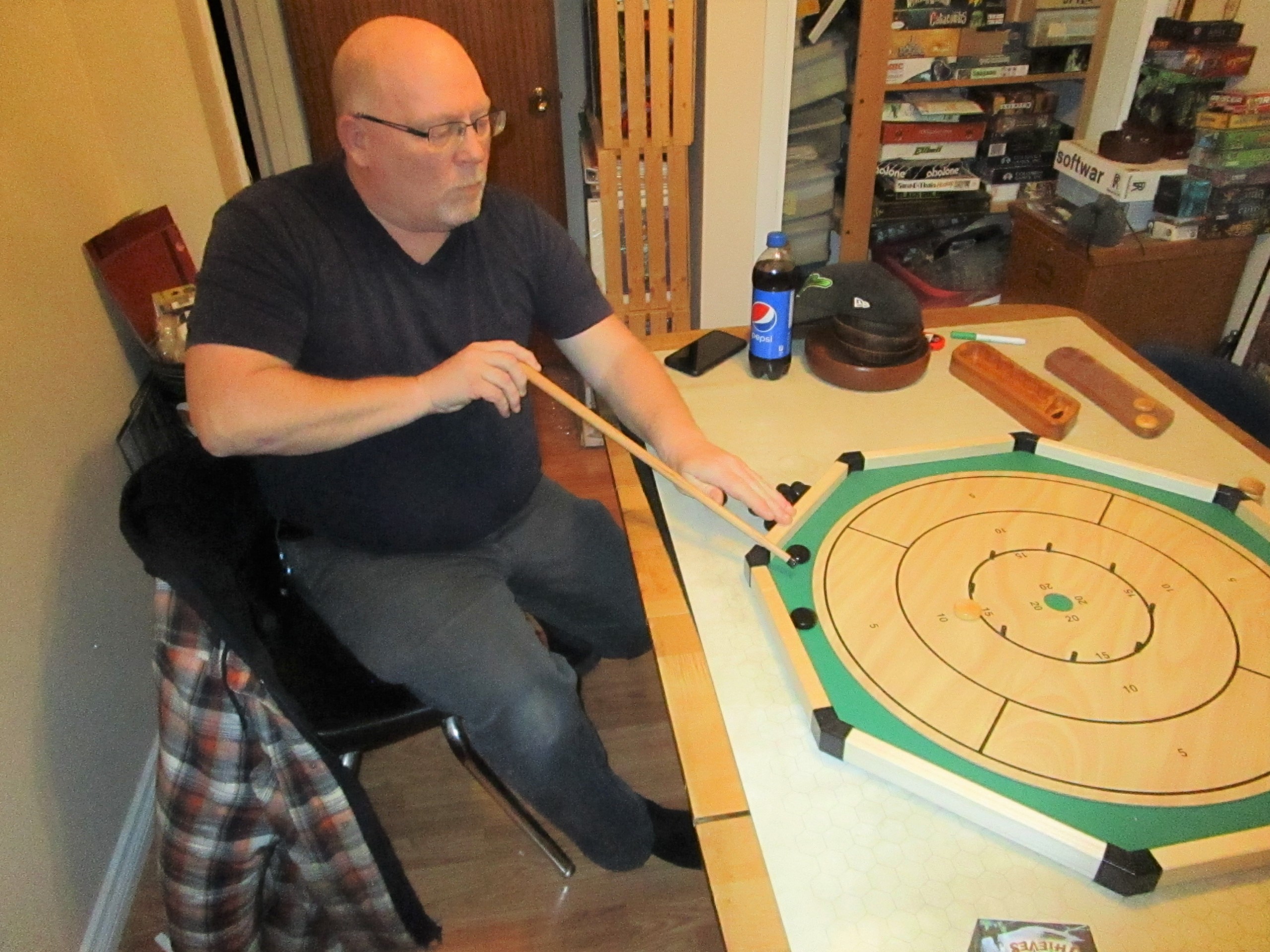 The Meeple Guild - Cues adds twist to classic crokinole 