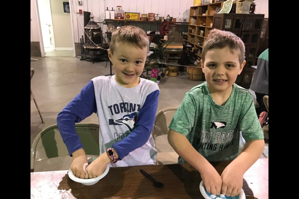 Jake Hockey, left, and Roenick Pratt used their hands for mixing the slime. Photo submitted