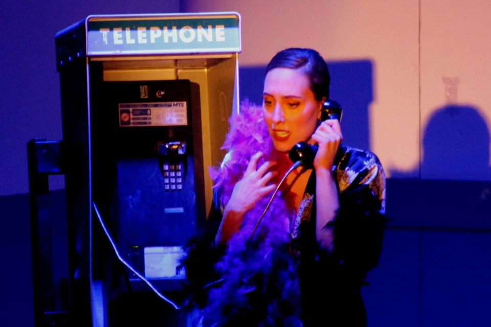 HELLO, OPERATOR: Cathy (Landice Yestrau) makes a call from a phone booth during the March 14 Ham Sandwich production of Shock Corridor, a stage adaptation of the 1963 Sam Fuller film of the same name. - PHOTO BY ERIC WESTHAVER