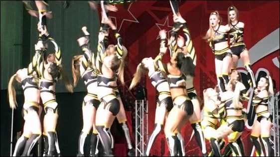 Here is a cropped photo of a pyramid, zoomed in on the bases. These cheerleaders are definitely not
