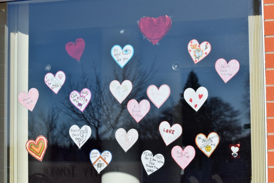 These hearts were captured at the Trinity Tower windows on Friday.