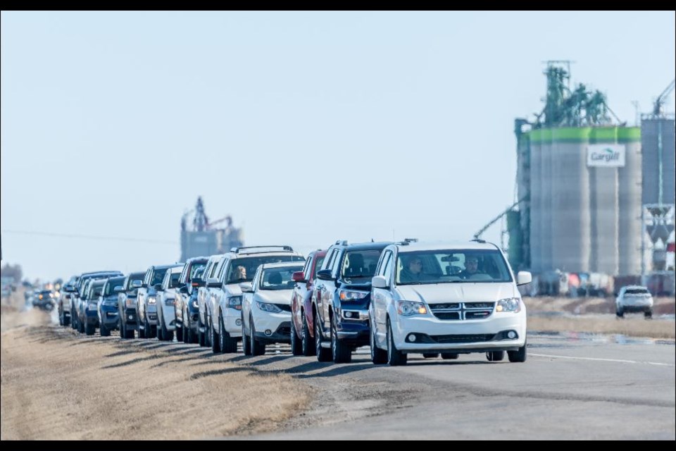 Vehicles begin lining up long before the convoy started to roll.