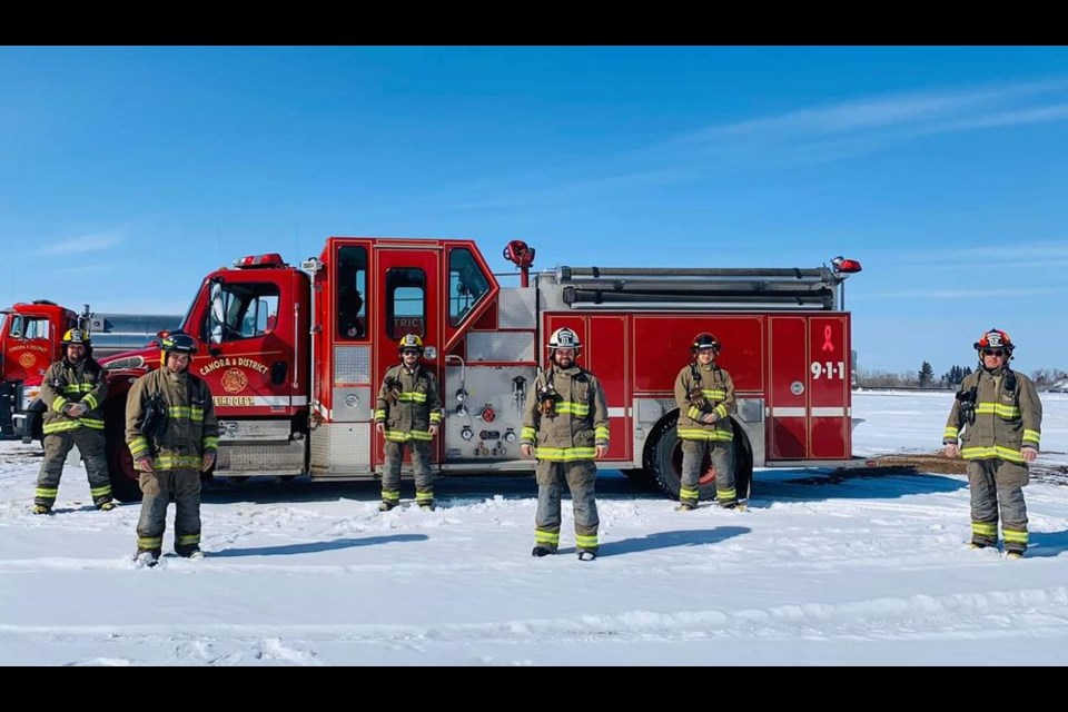 As a way of brightening the day of Canora and area children (and those young at heart) who are celebrating birthdays during the COVID-19 pandemic, Canora and District Fire Rescue members have offered to make a special birthday visit in full fire fighting gear, complete with flashing lights and sirens. Firefighters, from left, were: Jess Harper (captain), Tyler Kopeck (captain), Justin Gabora, Devon Sawka (fire chief), Liam Desrosiers and Eric Sweeney (deputy fire chief).