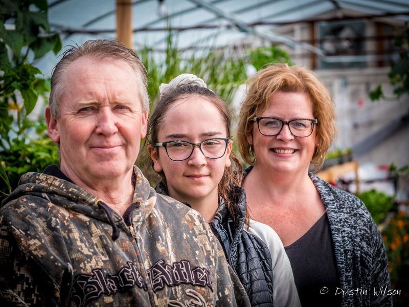 Wendy Becenko of Natural Reflexions Market, right, with husband Glen and daughter Makayla, has expanded the Farmer’s Market to include a greenhouse.