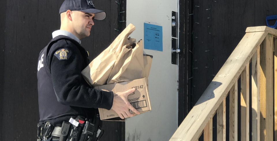 RCMP officers are delivering groceries to help community members practice physical distancing. RCMP