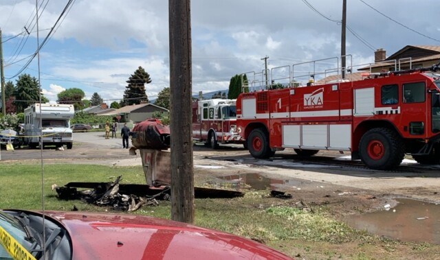 The tail of a crashed Snowbirds plane lies on Kamloops Glenview Avenue. Photo by Braden Capostinsky