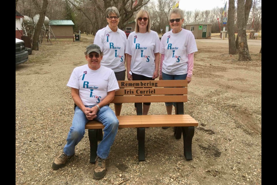 A bench in memory of Iris Curriel is completed and installed. Seated is Dave Finkas, standing, from left, are Pat Rae, Bonny Curzon and Cheryl Anseth. Photo submitted