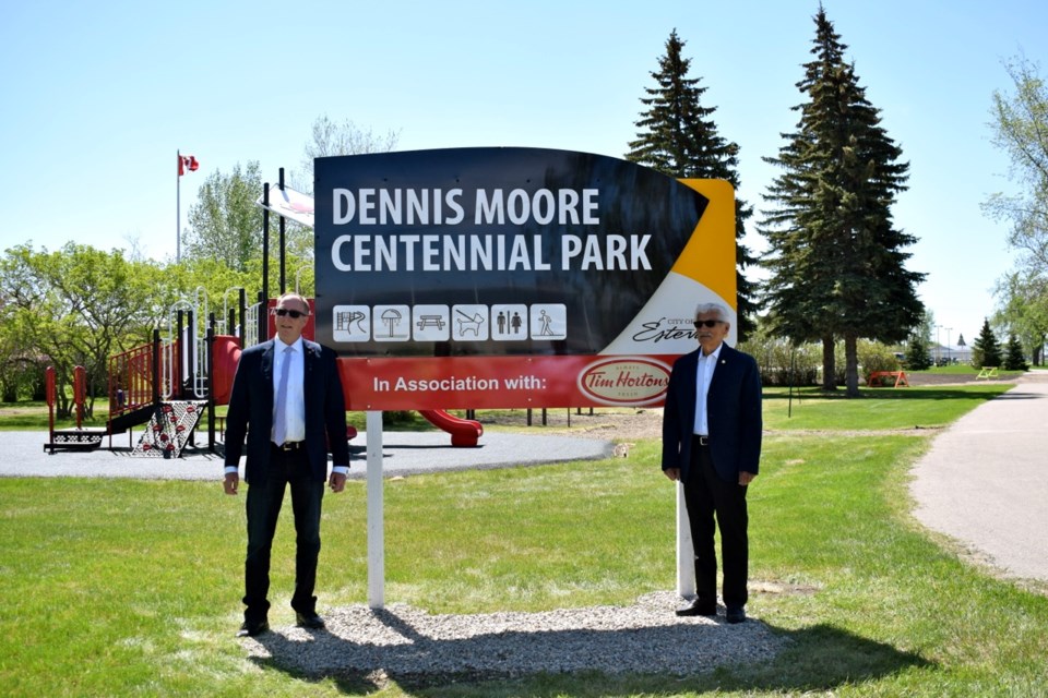Mayor Roy Ludwig, left, and city councillor Dennis Moore unveiled the park name.