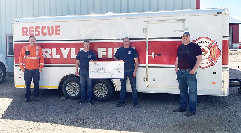 By way of the Richardson Foundation, Kingston Midstream is proud to present a cheque to Carlyle Fire and Rescue for $60,000.00. This donation will go towards the completion of their brand new building. Kingston Midstream values our frontline workers and those who work hard to keep us safe. We are so proud to be part of this history in Carlyle and area and we look forward to seeing the new building through completion. L-R: Travis VanMeer, Kingston Midstream Employee and Deputy Fire Chief; Rob Klassen, Deputy Fire Chief; Don VanMeer, Fire Chief; Jeff Lees, Kingston Midstream, Carlyle Foreman. Missing from photo John Brownlee, Deputy Fire Chief.
