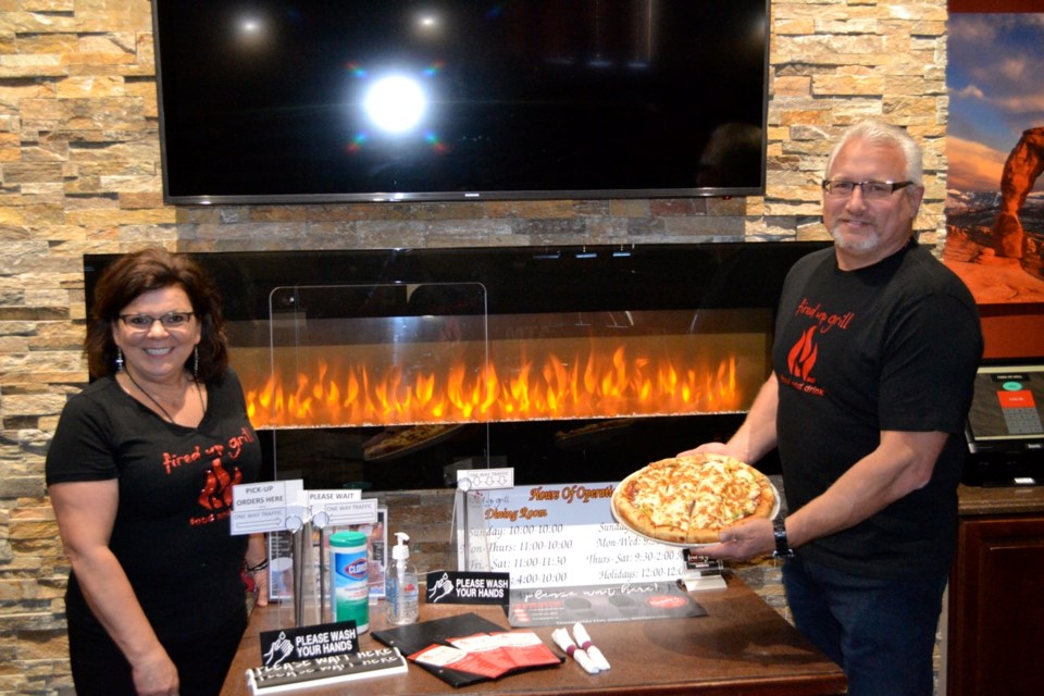 Sylvia and Robin Garchinski are looking forward to seeing customers once again at the Fired Up Grill restaurant in Estevan.