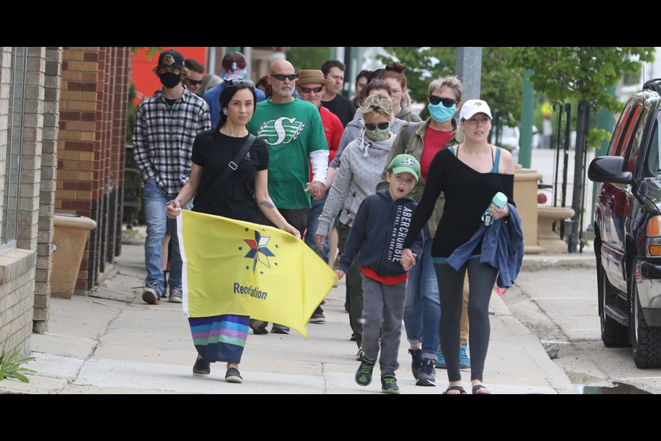 A reconciliation walk was held in Humboldt on National Indigenous Peoples Day. Photo by Devan C. Tasa