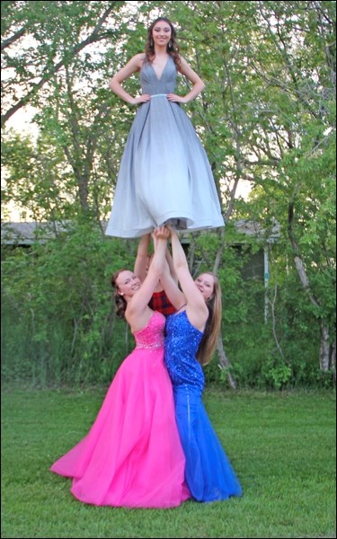 Double bases are Julia Marjoram on the left and Kjersti Graupe on the right. The top is Jenae Knot.