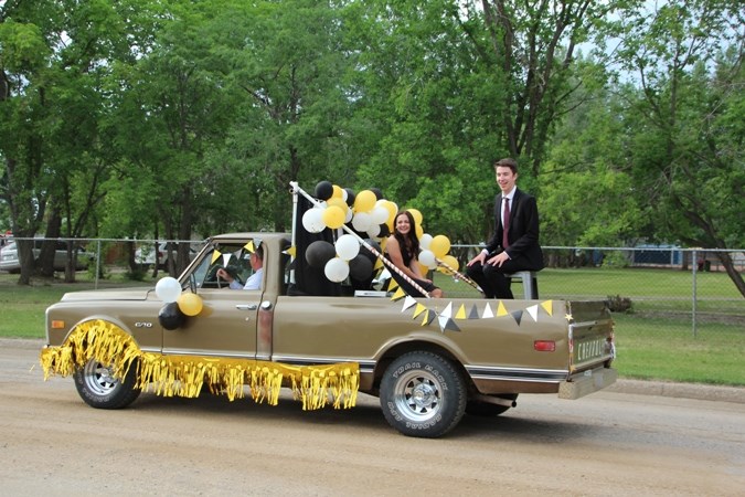 Unity’s June 26 graduation parade surpassed everyone’s expectations and may have created a new grad tradition. Each graduate decorated their own transportation while dozens of signs were held or erected in support of the class. One grad’s truck even sported a thank you to everyone who had contributed to their time in Unity. Photos courtesy of Morag Riddell