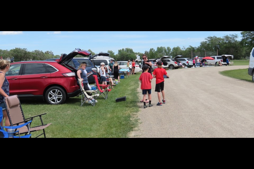 The school bus loop turned into a drive-thru station on Friday, June 26.