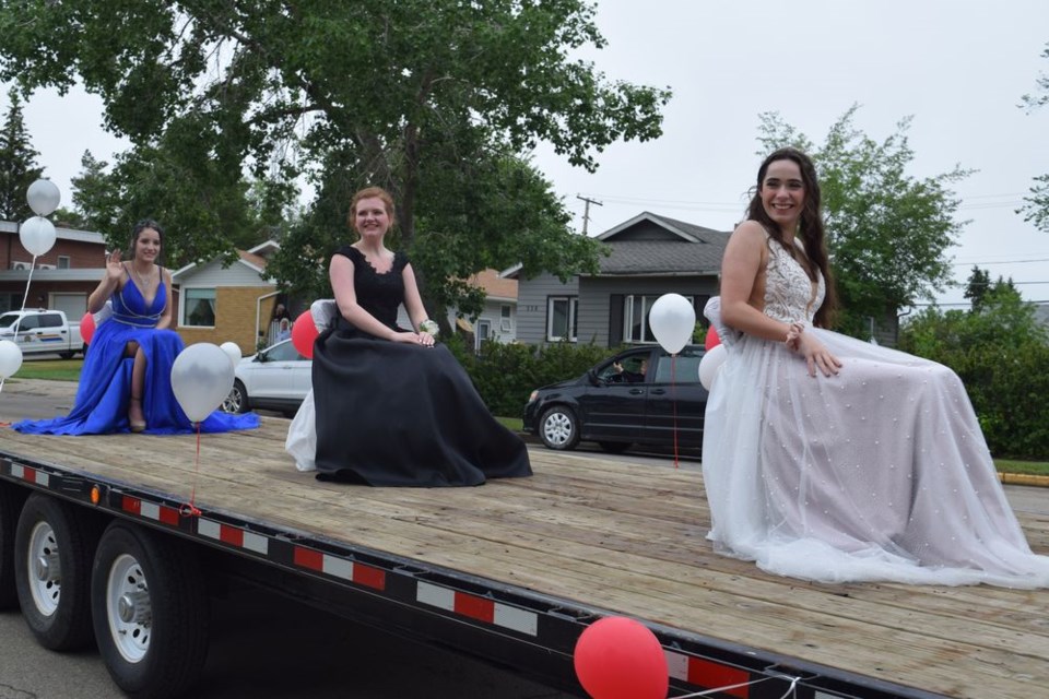 A parade through downtown Canora on June 29 gave residents the opportunity to see the Canora Composite School 2020 graduates in their finest formal attire and celebrate their accomplishments with them. From left, were: Ebonie Martin, Jordelle Lewchuk and Avigail Korolski.
