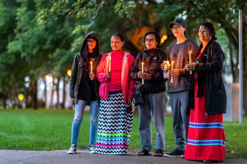 Women at a candlelight vigil at the Vimy Ridge memorial in downtown Saskatoon on July 13. Photo subm